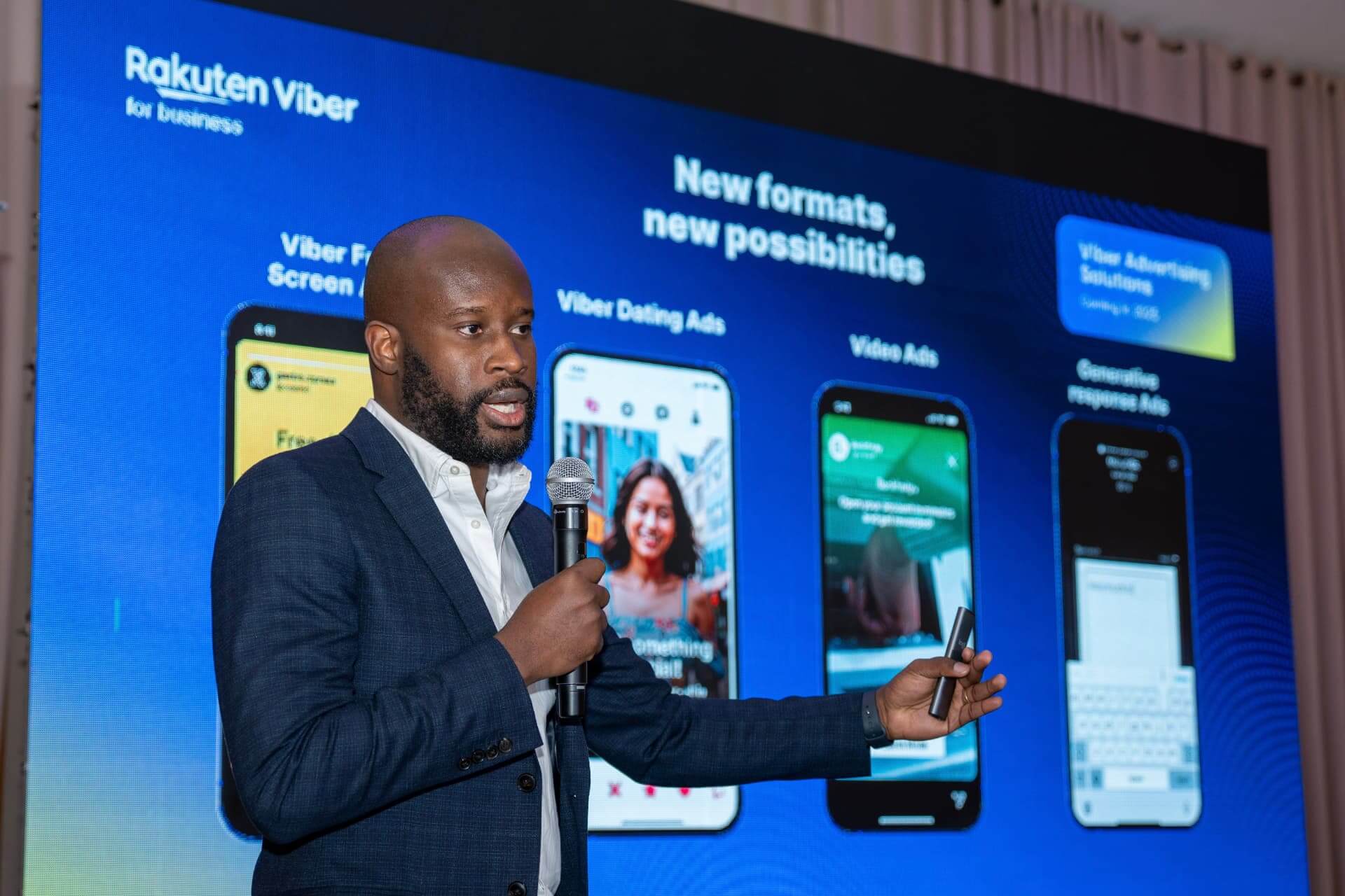 Speaker presenting new Viber ad formats on stage